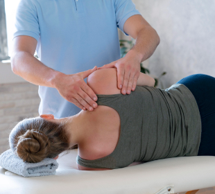 physiotherapist-massaging-patient-close-up